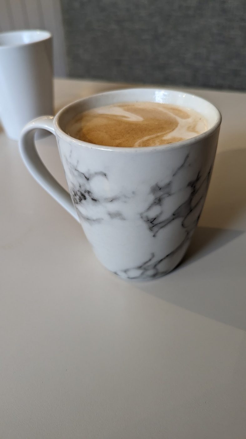 A coffee in a marbled mug